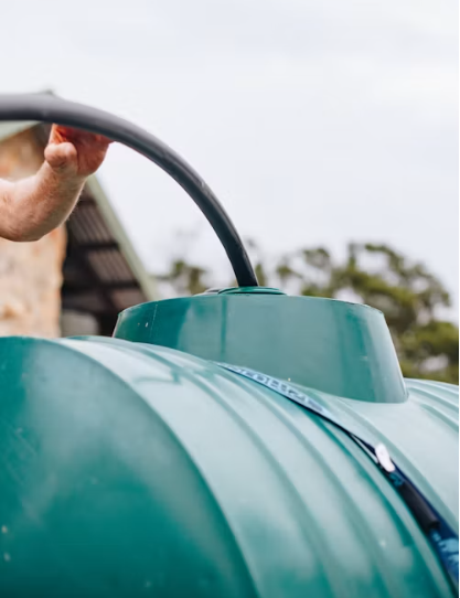 Close-up of a commercial-grade septic tank fitting, compliance inspection example