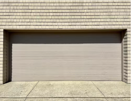 garage-door-beige-closeup Close-up of a beige sectional garage door, estimate pricing example